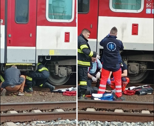 Muža spod vlaku vytiahli hasiči. Zdroj: archív redakcie